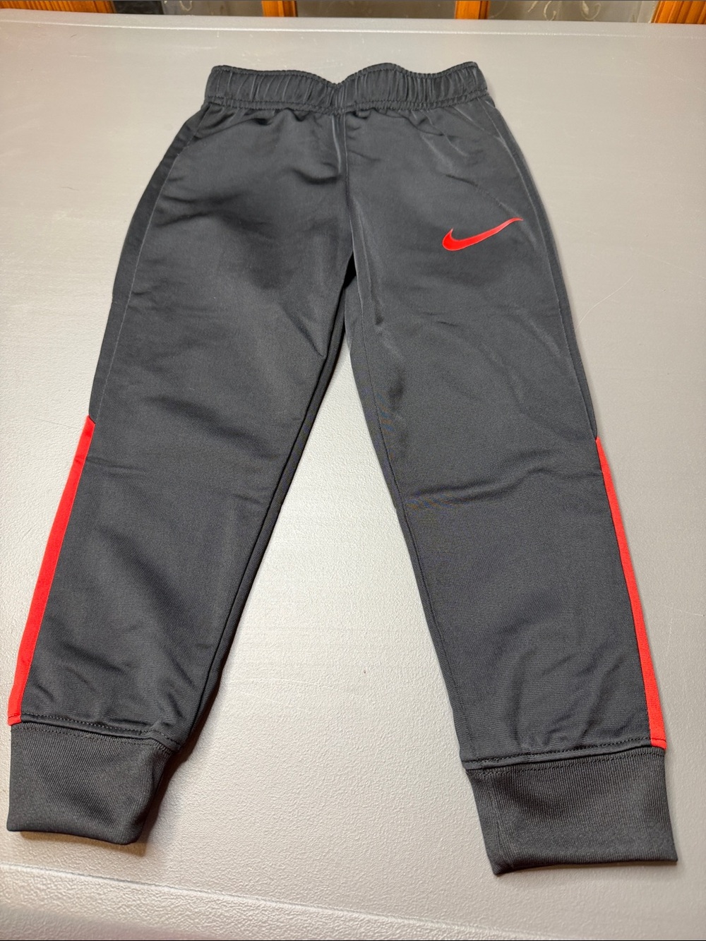 Kid’s Nike Red and Black Track Jacket and Joggers Set. Size: 4 - Picture 6 of 7